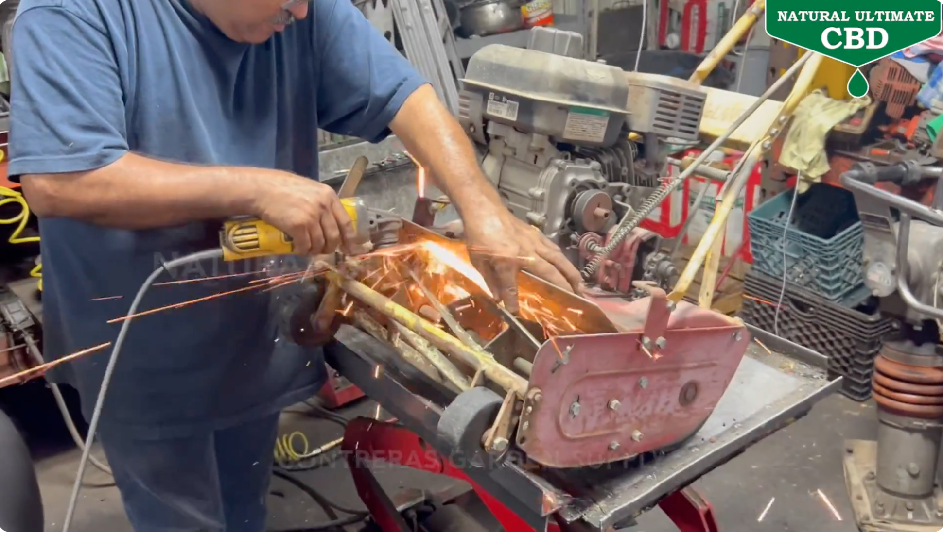 Technician sharpening lawn mower blades at Contreras Garden Supply, a local garden equipment repair shop and Natural Ultimate CBD retail partner