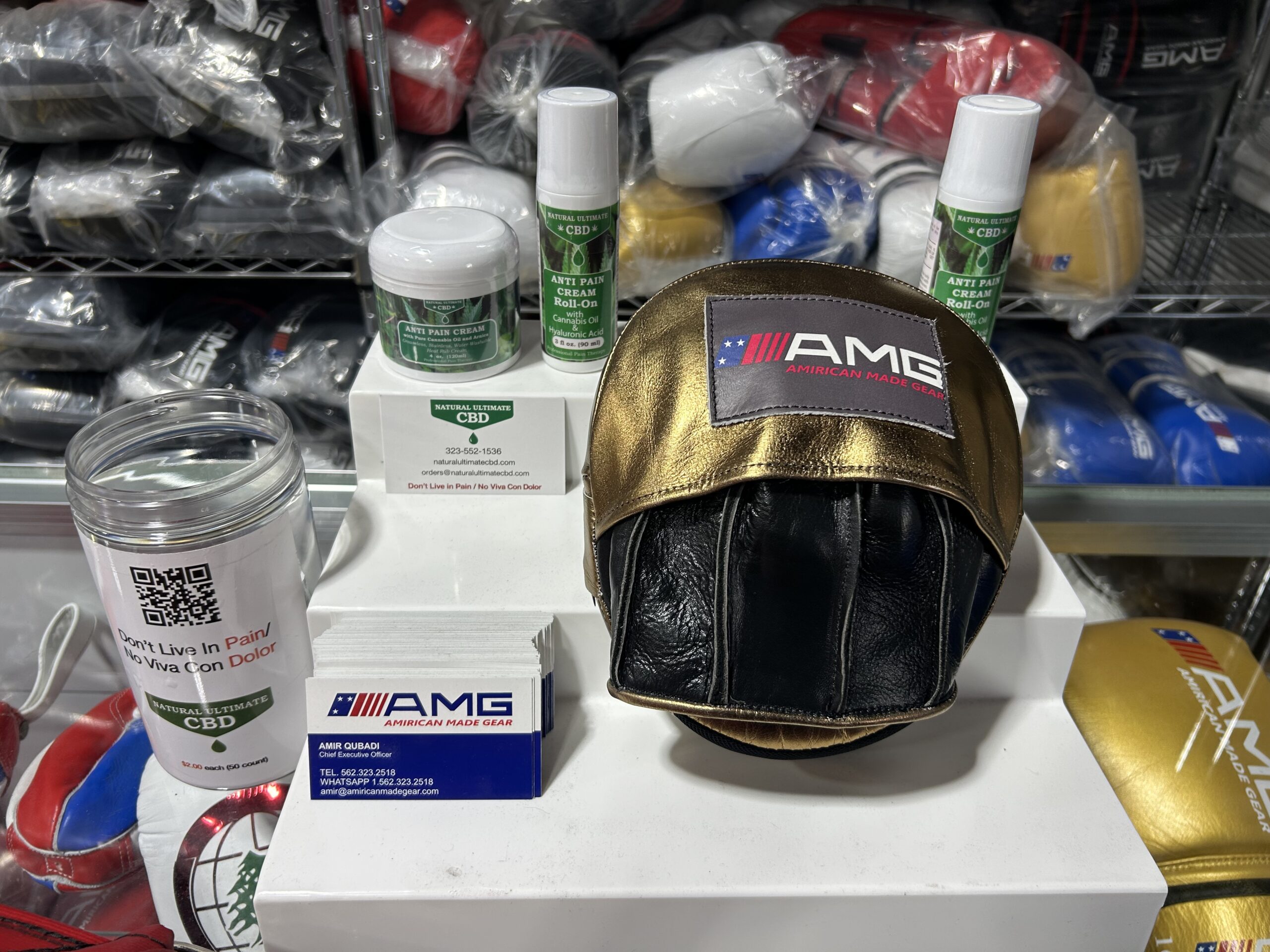 Natural Ultimate CBD products displayed with American Made Gear boxing equipment in Long Beach California